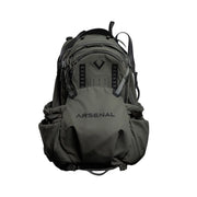 Dark green tactical backpack with multiple front pockets and black "Arsenal" logo on lower front panel.