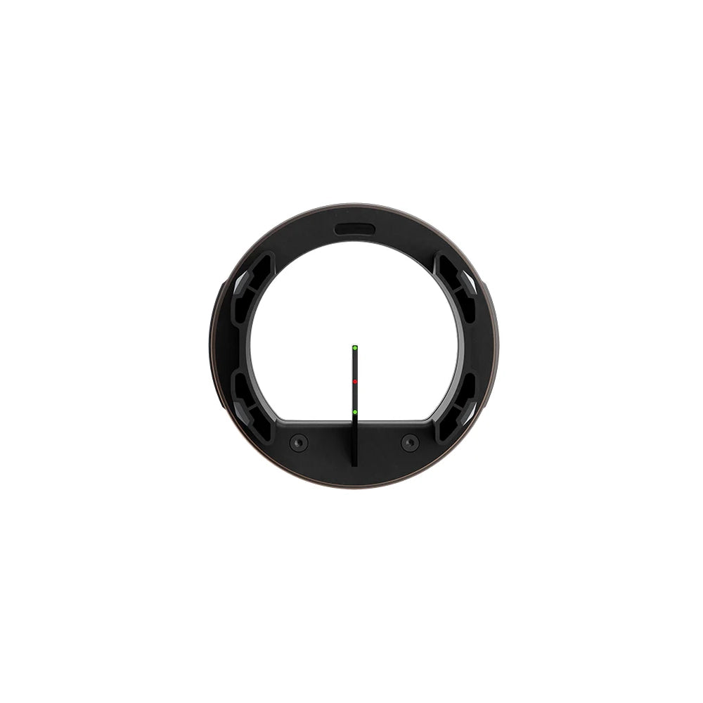 Black circular bow sight with a single green and red fiber optic pin centered vertically.