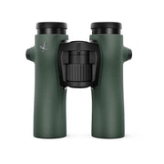 Compact dark green Swarovski NL Pure 10x32 binoculars with textured grip and central focus wheel.
